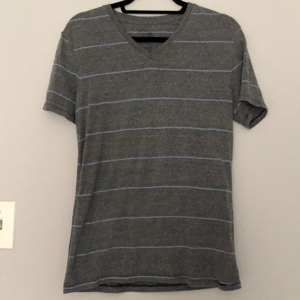 On the Byas gray and blue stripped shirt